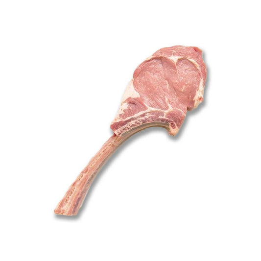 Raw tomahawk pork chop on a white background